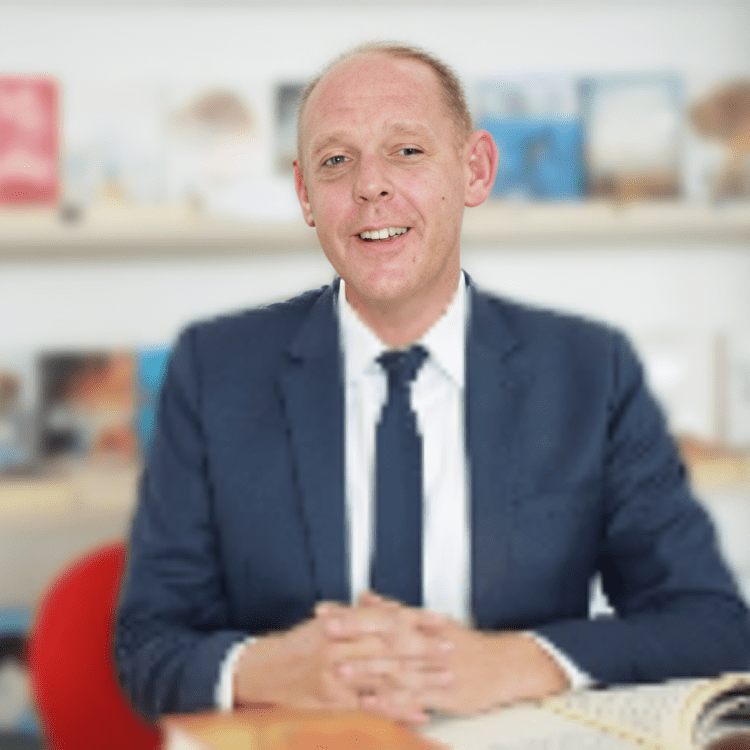 Businessman posing in professional environment